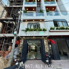 Bán nhà riêng: Nhà đường thông, DT:4.2x19M, Lửng, 3Lầu, 4PN, 6VS, Gara ô tô, S/t