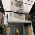 cần bán gấp căn nhà mặt tiền 1 trệt 2 lầu gần chợ thủ đức