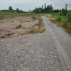 Đất MT rạch xã Trung An đường ô tô DT 3209m2 giá 1,7tr/m2