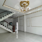 Cần bán nhà quốc lộ 50, gần cầu ông thìn 1 trệt 1 lầu sân thoáng mát rộng rãi