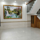 Nhà 1 trệt 2 lầu 12x8,5 Xây dựng 8x8,5 BTCT 4PN 4WC, có Gara Ô tô riêng