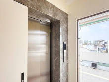 Nhà 2 mặt tiền trước sau Lý Thái Tổ (40m) - sổ 63,1/76,4m2 - 5 tầng có thang máy