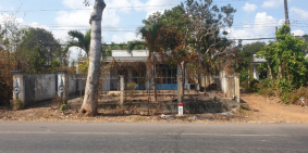 Cần bán đất có nhà cấp 4 mặt tiền quốc lộ diện tích 205m2