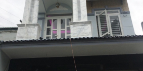 Nhà và Đất 1 Trệt 3 Lầu _ mặt tiền chợ thị trấn Tân Uyên