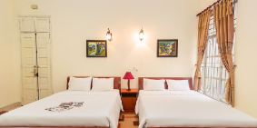 Cho thuê tầng 2 biệt thự 2 tầng mặt phố Quán Thánh 70m2 2PN, 2WC