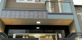 Bán nhà mới như hình ô tô đậu trước cửa