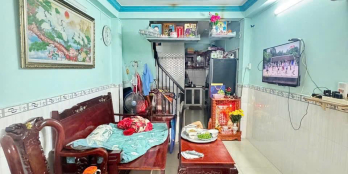 Nhà Gốc 2 mặt tiền quận 4 cách mặt tiền đường chính 30m² 1trệt lầu 2pn 2wc 