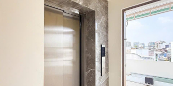 Nhà 2 mặt tiền trước sau Lý Thái Tổ (40m) - sổ 63,1/76,4m2 - 5 tầng có thang máy