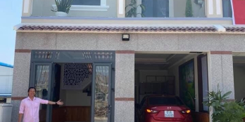 Bán nhà mặt tiền đường hẻm lớn oto quay đầu Tân Phước Khánh