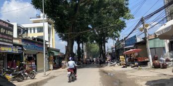 đất mặt tiền kinh doanh ngay chợ phú mỹ, 136m2, tc 80m2, dân cư sầm uất