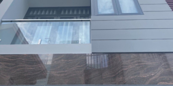 Nhà đường số Phường 4 Quận 4 xe hơi vào tới nhà