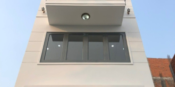 Nhà mặt tiền 4.5*20 ngay UBND THẠNH LỘC 1 trệt 4 lầu có thang máy SHR