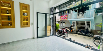 Nhà 1 trệt 4 lầu 6 PN, mặt tiền ngay ngã tư Hòa Bình - Tô Hiệu, full nội thất