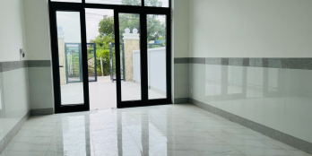 Cần bán căn liền kề 1 trệt 1 lầu Mặt tiền Đx.066 Định Hòa.TDM Bình Dương