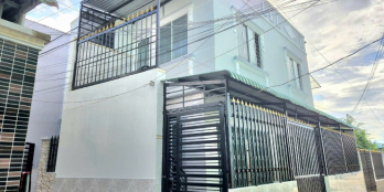 cần bán nhà mặt tiền đường lớn 1 trệt , 1 lầu , giá cực rẻ