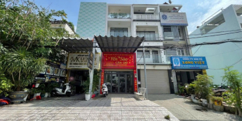 nhà 4x20m 4 lầu mặt tiền đường phú thuận Quận 7. giá thương lượng