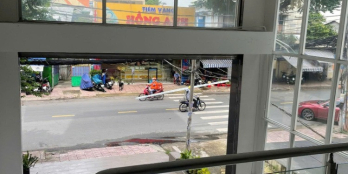 Bán tòa nhà góc 2MT Lê Quang Định, phường 14 quận Bình Thạnh, DT 5,57 x 42m, HĐT