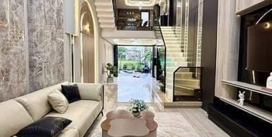 Bán nhà riêng: Nhà đường thông xe hơi, DT:4x15,5M, Lửng, 3 Lầu, 4PN, Gara ô tô, 