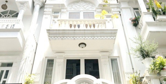 Bán gấp nhà 3 lầu sân thượng mặt tiền cực đẹp Vĩnh Hội quận 4.