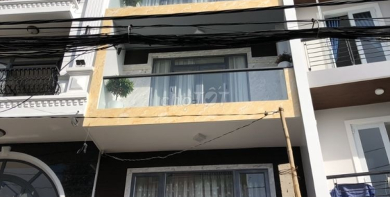 Bán nhà mặt tiền đường mới 100% - Trệt + 4.5 Lầu