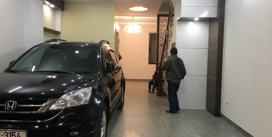 Bán nhà,36 Đào Tấn,thuê 600 tr/năm,58m2x7T,mt 5m, Gara,thang máy,15,8 tỷ