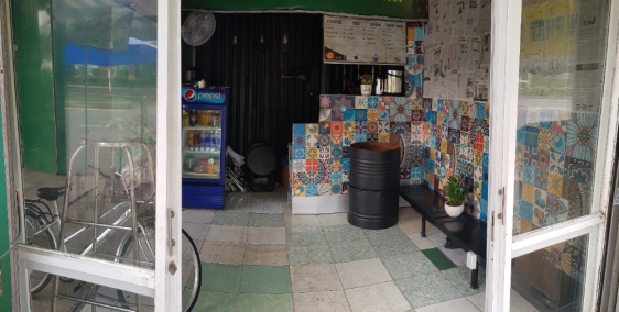 sang quán cà phê ngay cầu vượt quang trung