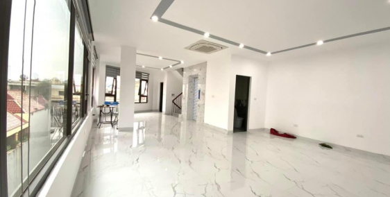 Bán tòa nhà 7 tầng thang máy mặt phố Xã Đàn, Đống Đa, mặt tiền rộng, kinh