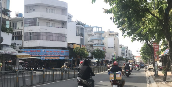 Bán Nhà MẶT TIỀN KD đường Nguyễn Tri Phương,Q.10,DT:11mx28m,KC: 2  lầu,,Giá:75